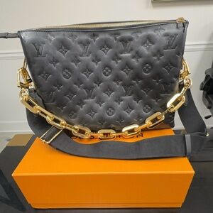 Authentic Louis Vuitton Coussin MM Black Sheepskin handbag.